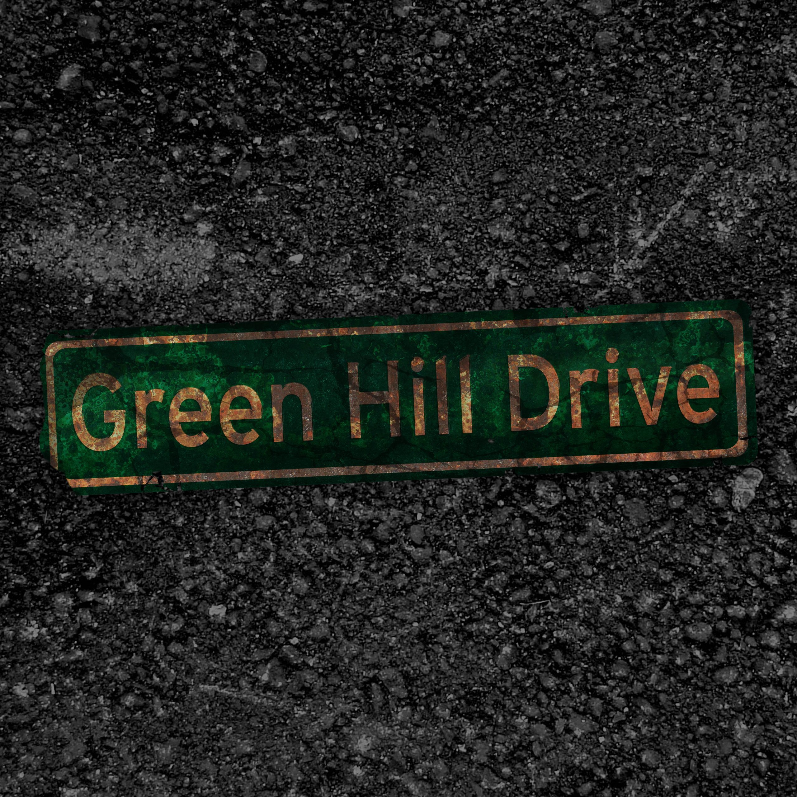 Green Hill Drive Logo on Gravel Background